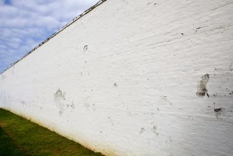 Old white brick wall perspective Stock Photos