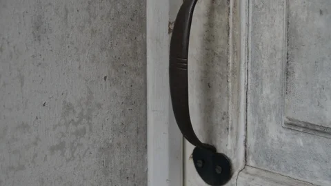Old white colonial door close up on door handle Stock-Footage 104465706