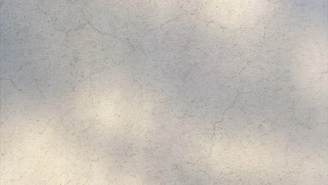 Old white concrete wall with light leaks - cracks - top view - background Stock Footage 138523409