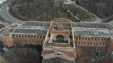 Old white dilapidated building with columns in the city Stock Footage 158855236
