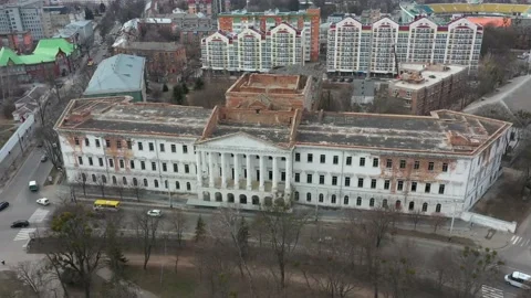 Old white dilapidated building with columns in the city Stock Footage 158855238