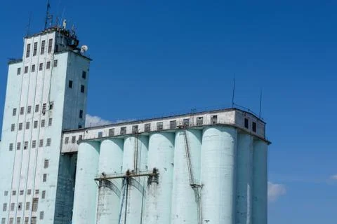 Old white elevator on a background of the blue sky Stock Photos