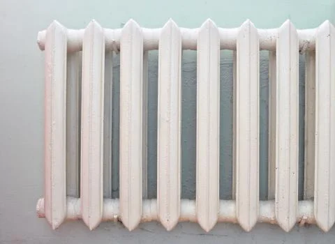 The old white heating radiator Stock Photos
