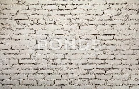Old white painted grunge brick wall background Stock Photos