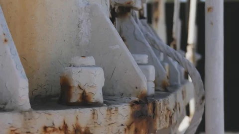 Old white rusty pipe of large ship above calm blue wavy water surface close v Stock Footage 114625777