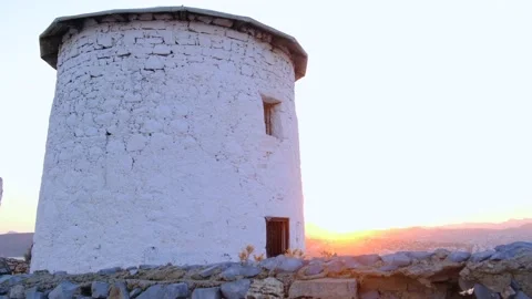 Old, white, stone windmill in Bodrum, Turkey at sunset. Stock Footage 144433154