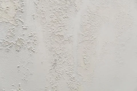 Old white wall with mold texture background. messy wall stucco texture Stock Photos