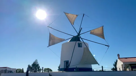 Old white windmill operating in the south of Portugal Video stock 230430257