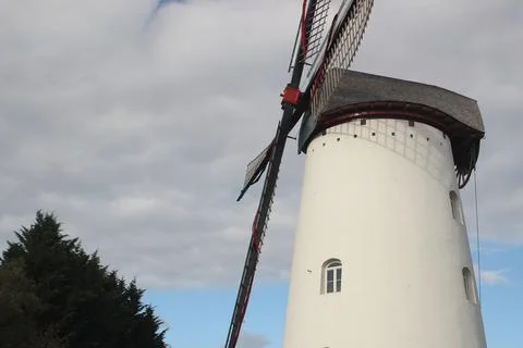 Old white windmill Stock Photos