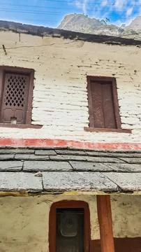 An old whitewashed stone wall. Stock Photos