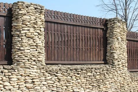 Old wild stone wall without mortar Stock Photos