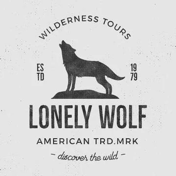 Old wilderness label with wolf and typography elements. Vintage style wolf logo Illustrazione stock