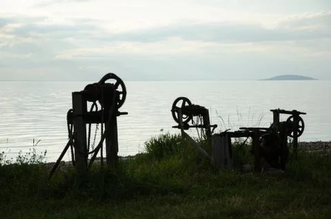 Old winch silhouettes Stock Photos
