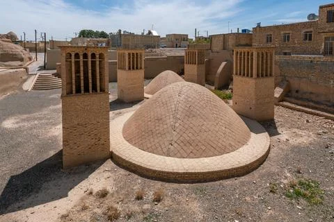 Old wind catchers, or wind towers, jst next to the old castle of Naein in Yazd Stock Photos