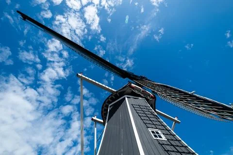 An old windill seen from down below, looking up. Stock Photos