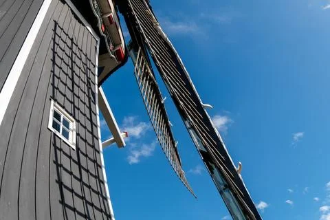 An old windill seen from down below, looking up. Stock Photos