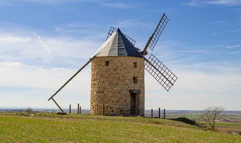 Old windmill and stone windmill. Stock Photos