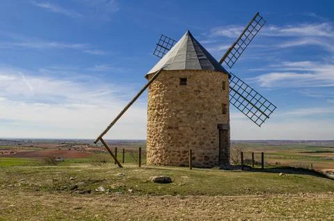Old windmill and stone windmill. Stock Photos
