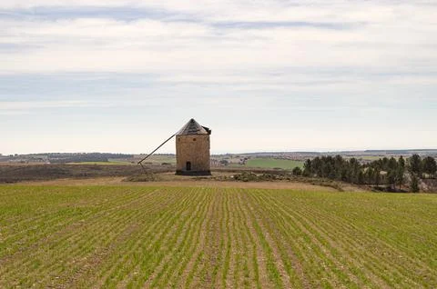 Old windmill and stone windmill. Stock Photos
