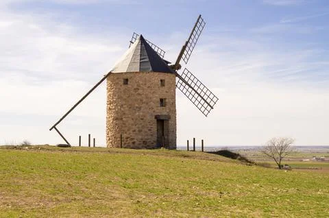 Old windmill and stone windmill. Stock Photos