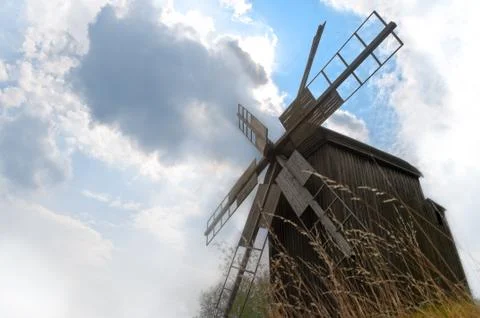 Old windmill with cloudy sky Stock Photos