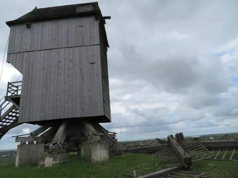 Old windmill destroyed by the passage of time hurts relic Stock Photos