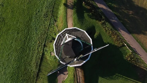 Old windmill for flour production in typical dutch landscape 動画素材 119437598