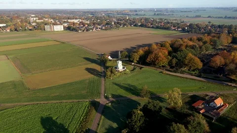Old windmill for flour production in typical dutch landscape 動画素材 119437640