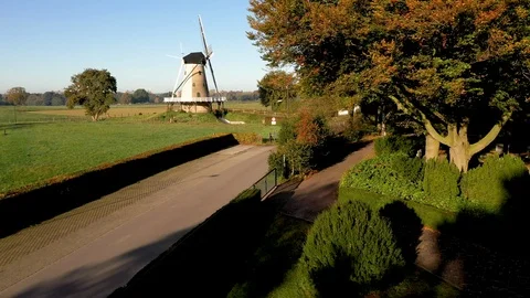 Old windmill for flour production in typical dutch landscape 스톡 동영상 119438259