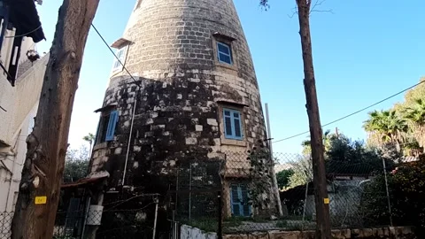 An old windmill now without the wings, used today as a residence, Haifa, Israel Видео 146475928