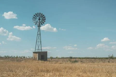 Old windmill Old windmill at blue cloudy sky ,model released, Symbolfoto C... Stock Photos