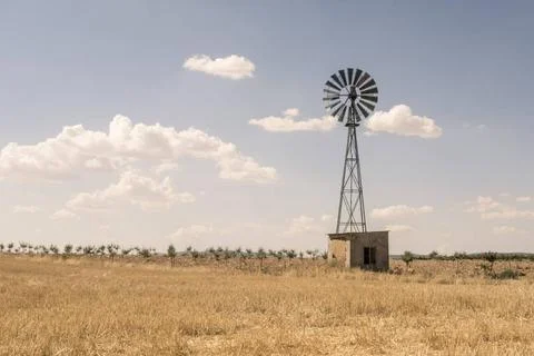Old windmill Old windmill at blue cloudy sky ,model released, Symbolfoto C... Stock Photos