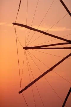 Old windmill in the sunset Foto stock