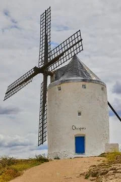 Old windmill in top of the hill in Consuegra Village Stock Photos