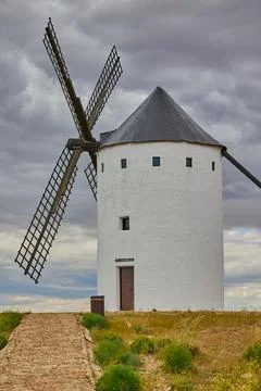 Old windmill in top of the hill in Spain Stock Photos