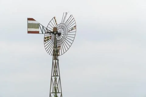 Old windmill, wind power station in the white sky energy environmental Stock Photos
