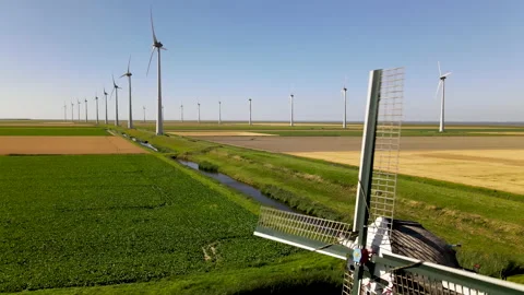 Old windmill with windturbines 動画素材 138046082