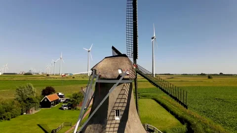 Old windmill with windturbines 動画素材 138046114