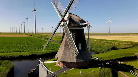 Old windmill with windturbines 動画素材 138046429