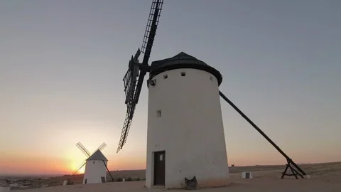 Old windmills in the sunset at La Mancha, Spain, the land of Don Quixote Stock-Footage 107271558