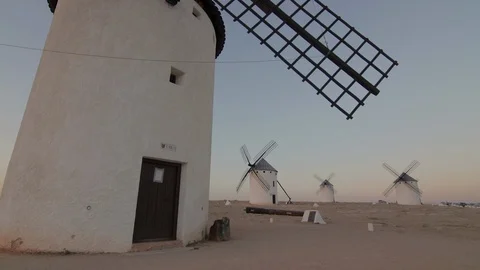 Old windmills in the sunset at La Mancha, Spain, the land of Don Quixote Stock-Footage 108612396