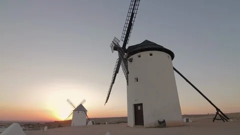 Old windmills in the sunset at La Mancha, Spain, the land of Don Quixote Stock-Footage 109505245