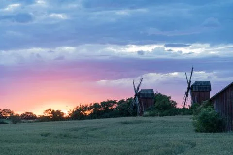 Old windmills by sunset Stock Photos