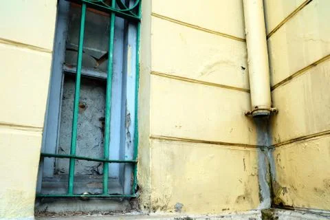Old Window and Drain Pipe on Vintage Building. Stock Photos