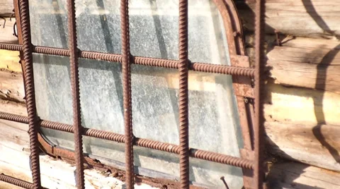 Old window with bars Video stock 36078899