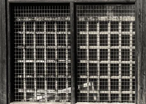 Old window with bars l Stock Photos