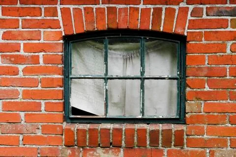 Old window in brick wall Stock Photos