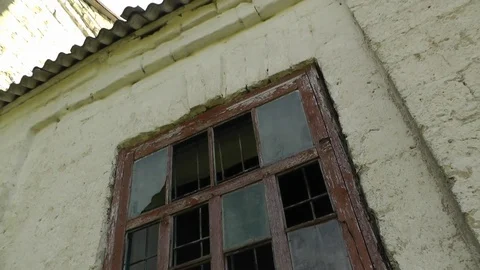 Old window with broken glass Stock Footage 74580976