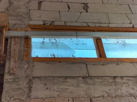 Old window in the construction Stock Photos