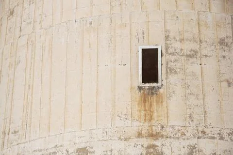 Old window display on the cement wall background Stock Photos